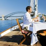 D158-hero-australia-honeymoon-couple-on-yacht-with-bbq-sydney-opera-house-harbour-bridge-nsw-2000x837